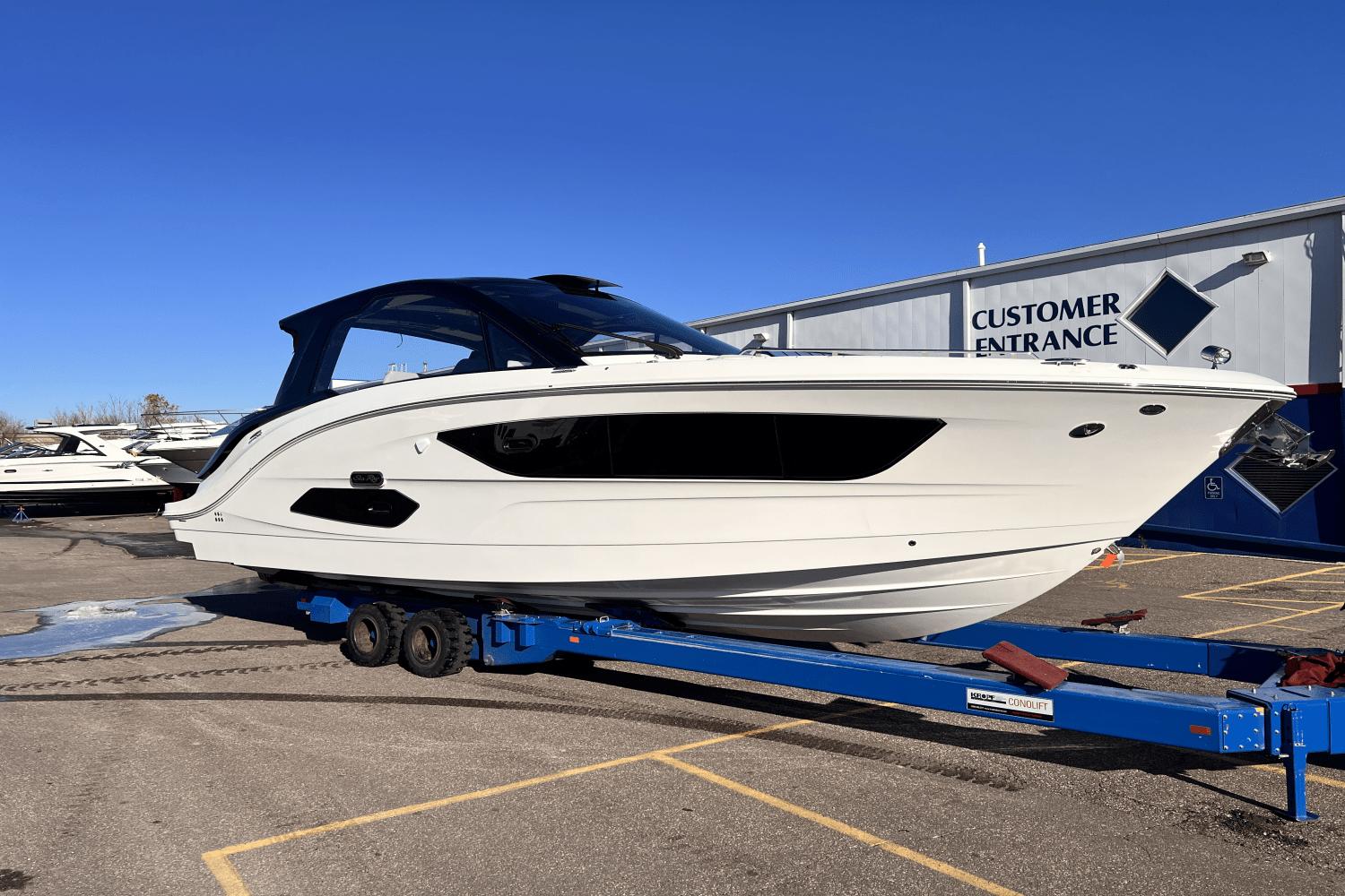 Boat helm and steering wheel with water view